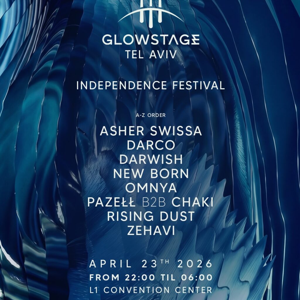 קהל גדול רוקד בפסטיבל GLOWSTAGE עם תאורת במה מרשימה